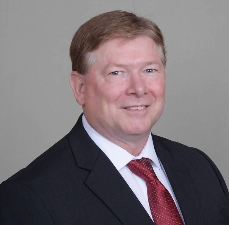 Tim Snyder wearing a suit and tie